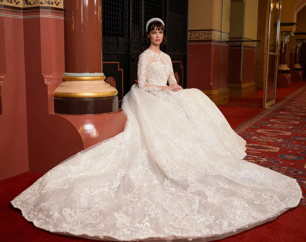 Bride in a Jullia Bridal lace ballgown with the train swept across the red carpet at The Hotel Windsor, Melbourne; creative direction and styling by Tamarra McNaught, founder of TITO STYLE.
