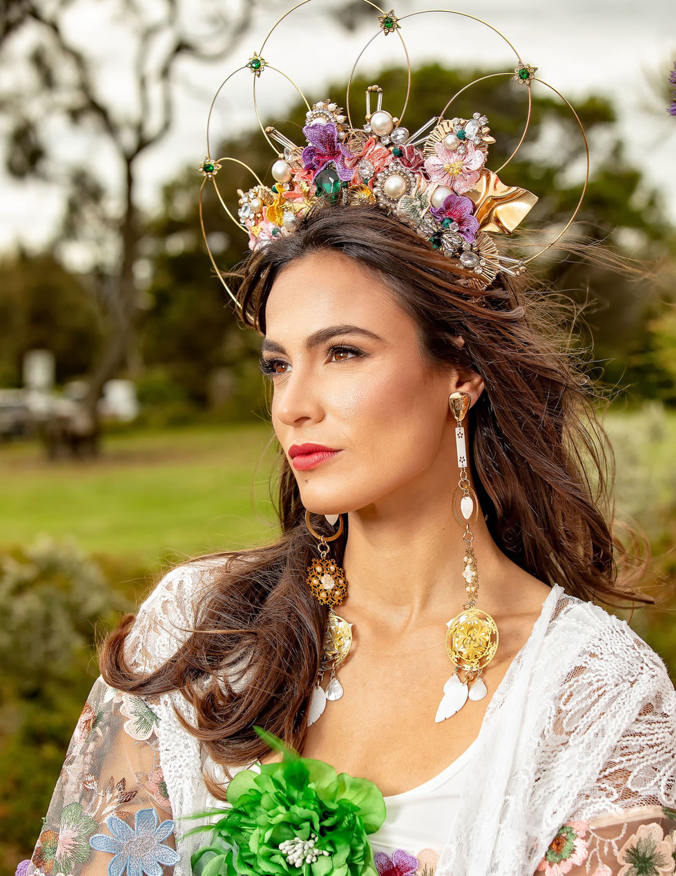 A model in a flower crown and sheer embellished look, in soft light. A Harlow Loves Daisy look, with styling by Tamarra McNaught, founder of TITO STYLE, at Brighton, Melbourne, Australia.