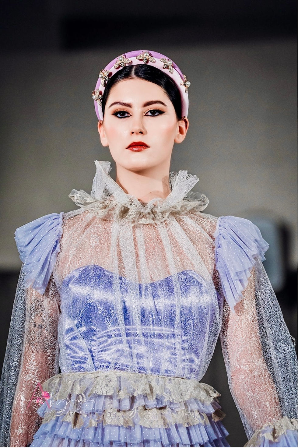 A lavender ruffled tulle gown with puff sleeves and a jewelled headband. A Judith Penak Couture look, with creative direction and styling by Tamarra McNaught, founder of TITO STYLE, at The Hotel Windsor, Melbourne, Australia.