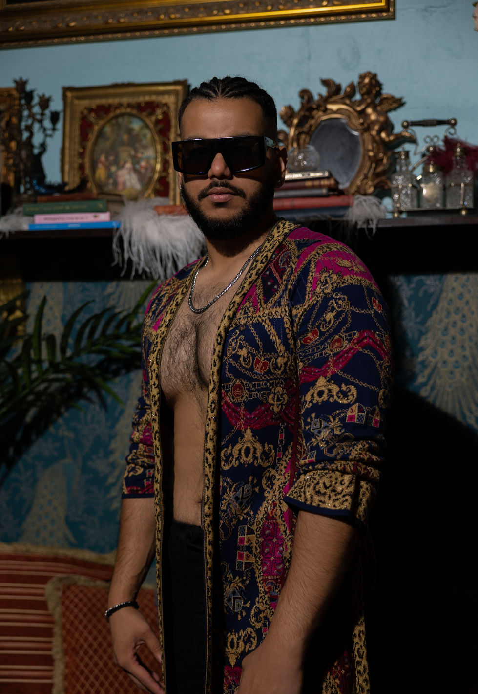 Full look in a baroque print jacket with fur trim and gold chains against a gilded frame at Lady Peacock Lounge, St Kilda, Melbourne, Australia, creative direction and styling by Tamarra McNaught, founder of TITO STYLE