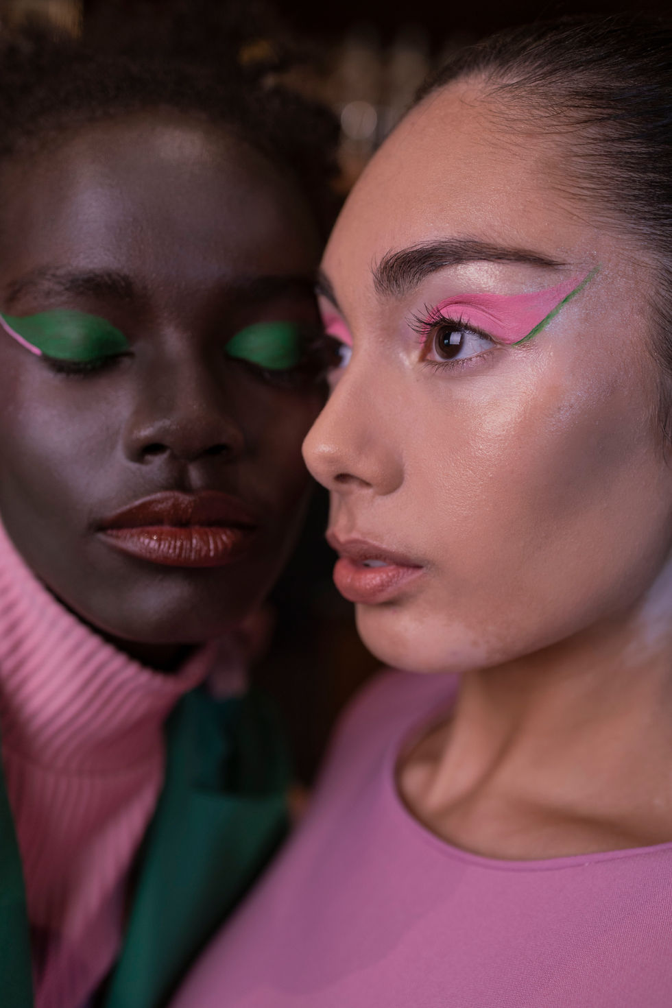 Two pink looks with vivid green and pink eye makeup, shot close. Moss & Spy looks, with creative direction and styling by Tamarra McNaught, founder of TITO STYLE, at Riverlea Estate, Warrandyte, Victoria, Australia.