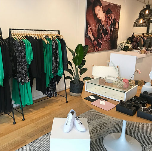 Boutique styling session in Melbourne, Australia curated by Tamarra McNaught, fashion and celebrity stylist and founder of TITO STYLE. Featuring curated fashion racks, white sneakers, and luxe accessories, this setup reflects her sustainable and tailored approach to personal styling.