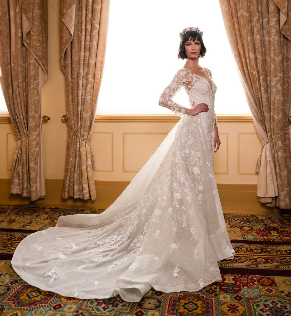 Bride in a Jullia Bridal long-sleeve lace gown with a beaded train framed by gold damask curtains at The Hotel Windsor, Melbourne; creative direction and styling by Tamarra McNaught, founder of TITO STYLE.