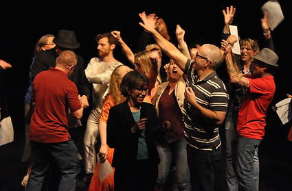 TNC staff and members celebrate after Big Gig dress rehearsal