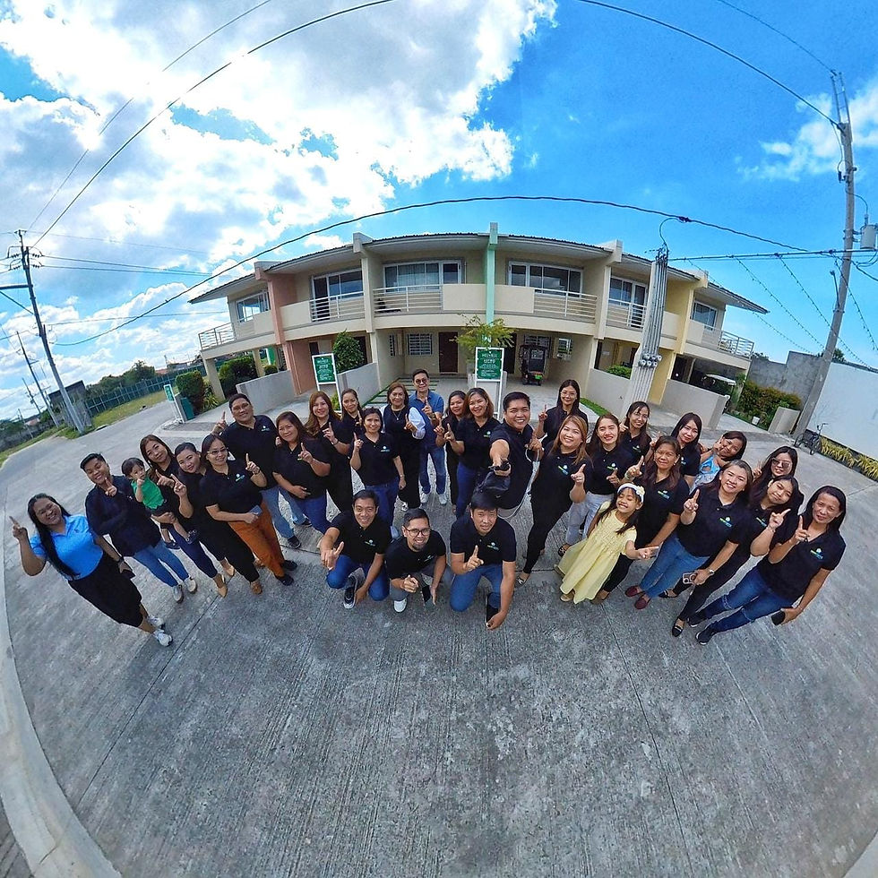 OUR PIC-INFRONT OF NEUVILLE HOUSES.jpg