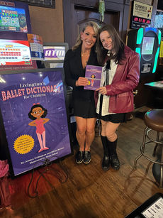 Jessica Wellington and Olivia Barner promoting Livington Books.