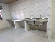 Finished kitchen sin and tile.jpeg