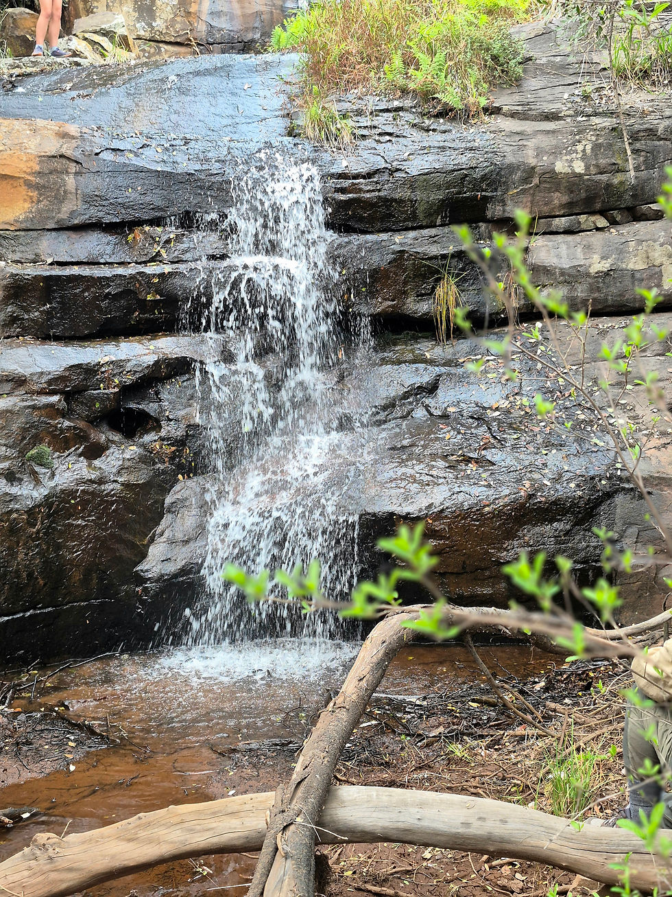 One of a few smaller waterfalls