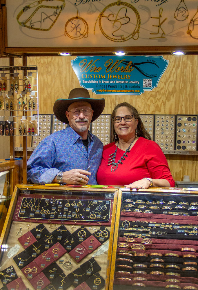 Craig and Cheryl Kime at their booth during one of many stops on the circuit.