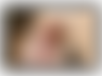 a newborn baby crying as the mother holds baby and tries to comfort