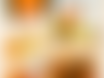 Flat lay of fall picture books with pumpkins, leaves, pinecones, and acorns for autumn classroom reading.