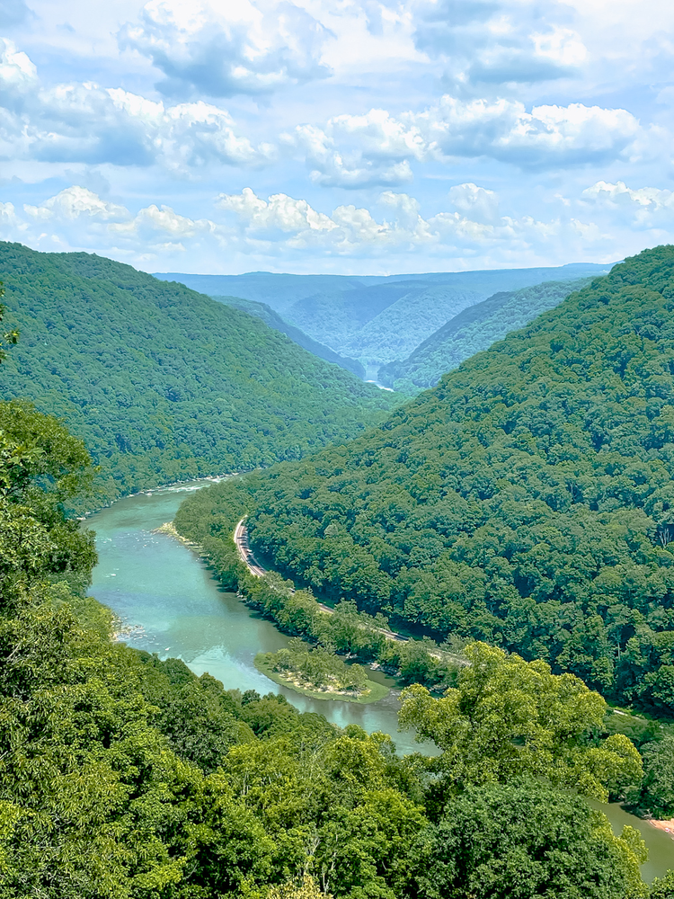 A river winding through a green gorge
