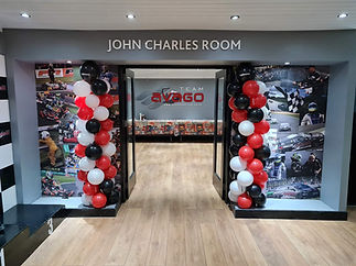 Entrance to the John Charles Room, adorned with black