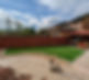 A well-maintained garden featuring artificial grass