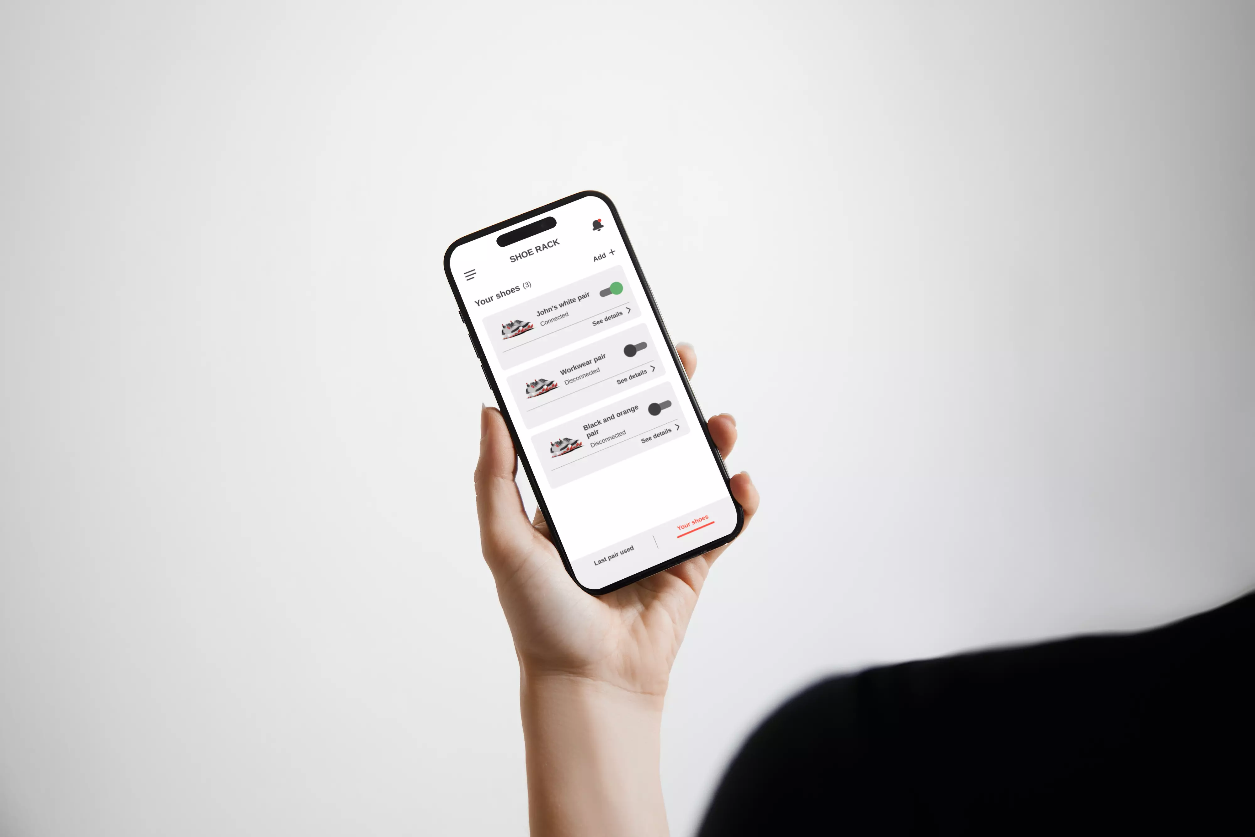 Hand of a person who is using WAHU App