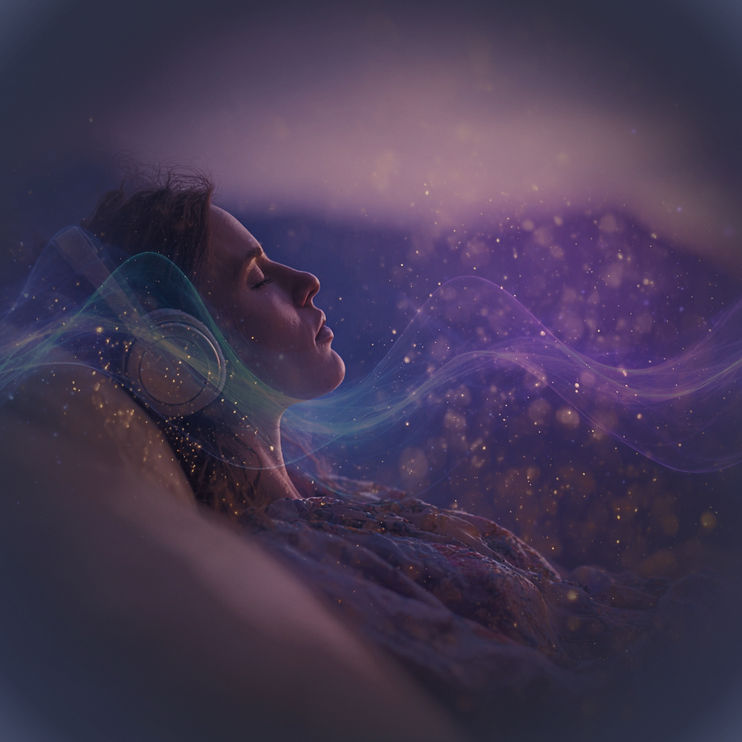 woman sits_on_a_couch_in_a_spacious_livi