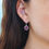 Thumbnail: 5.7 Carat Ruby Oval Dangle Earrings Diamond Halo