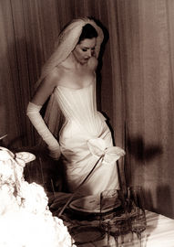 Editorial bridal portrait on film of a bride in a corset gown and veil, captured in Paris by fine art wedding photographer Hastings & King.