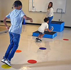 BDS Student Playing Hopscotch