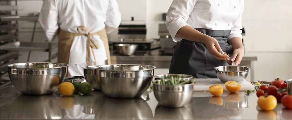 Chefs cooking in kitchen