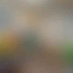 Decorations at the Washington West Company Jubilee including a colorful birthday quilt, flowers, and balloons celebrating 125 years of the Daughters of Utah Pioneers.