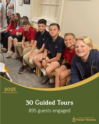 Students waiting for a guided tour at the DUP McQuarrie Memorial Museum in St. George, Utah.