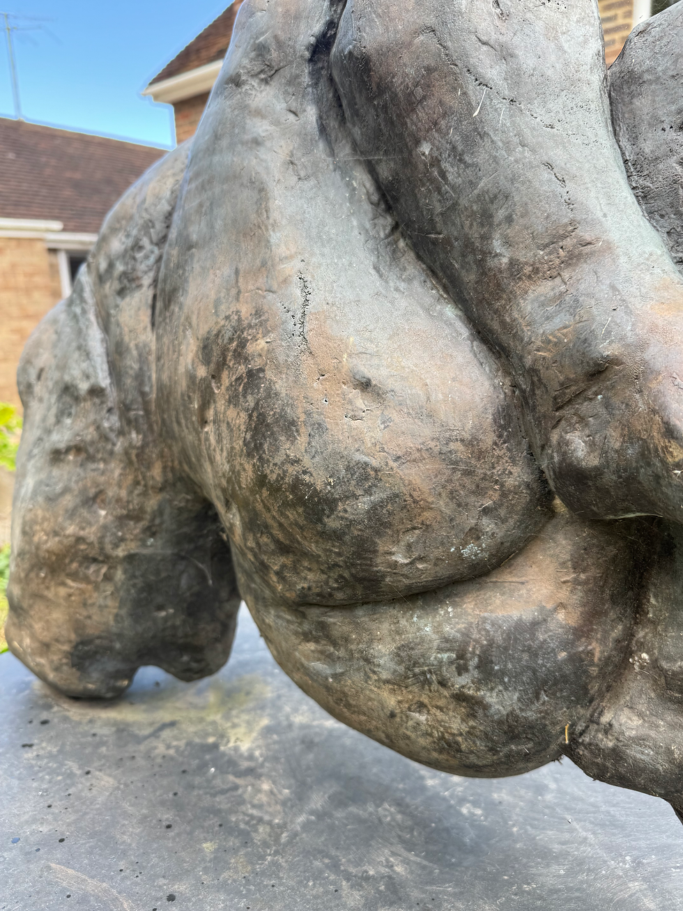 Thumbnail: Large reclining figure in bronze mounted on slate