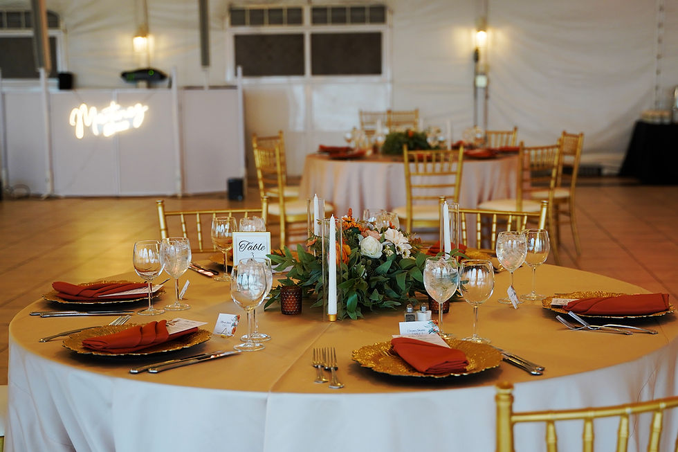 Wedding tablescape styling with gold chargers and floral centerpiece in Maryland