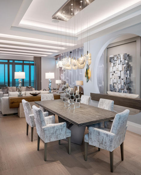 a dining room modern luxury interiors, high-end finishes, sleek elegance, Bay Colony, Naples FL