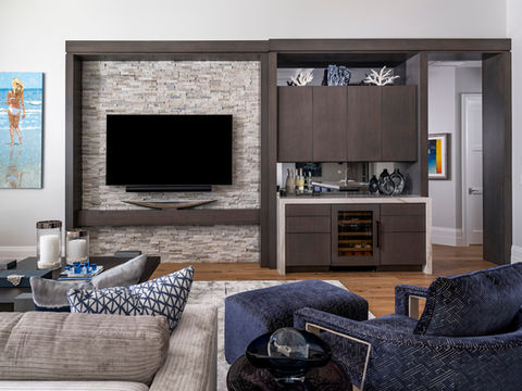 Neutral-toned luxury family room with custom furnishings in Naples golf home