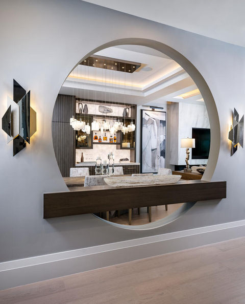 a dining room modern luxury interiors, high-end finishes, sleek elegance, Bay Colony, Naples FL