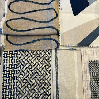 Mood board featuring fabric swatches, paint chips, and natural wood finishes for a coastal-inspired luxury living room design