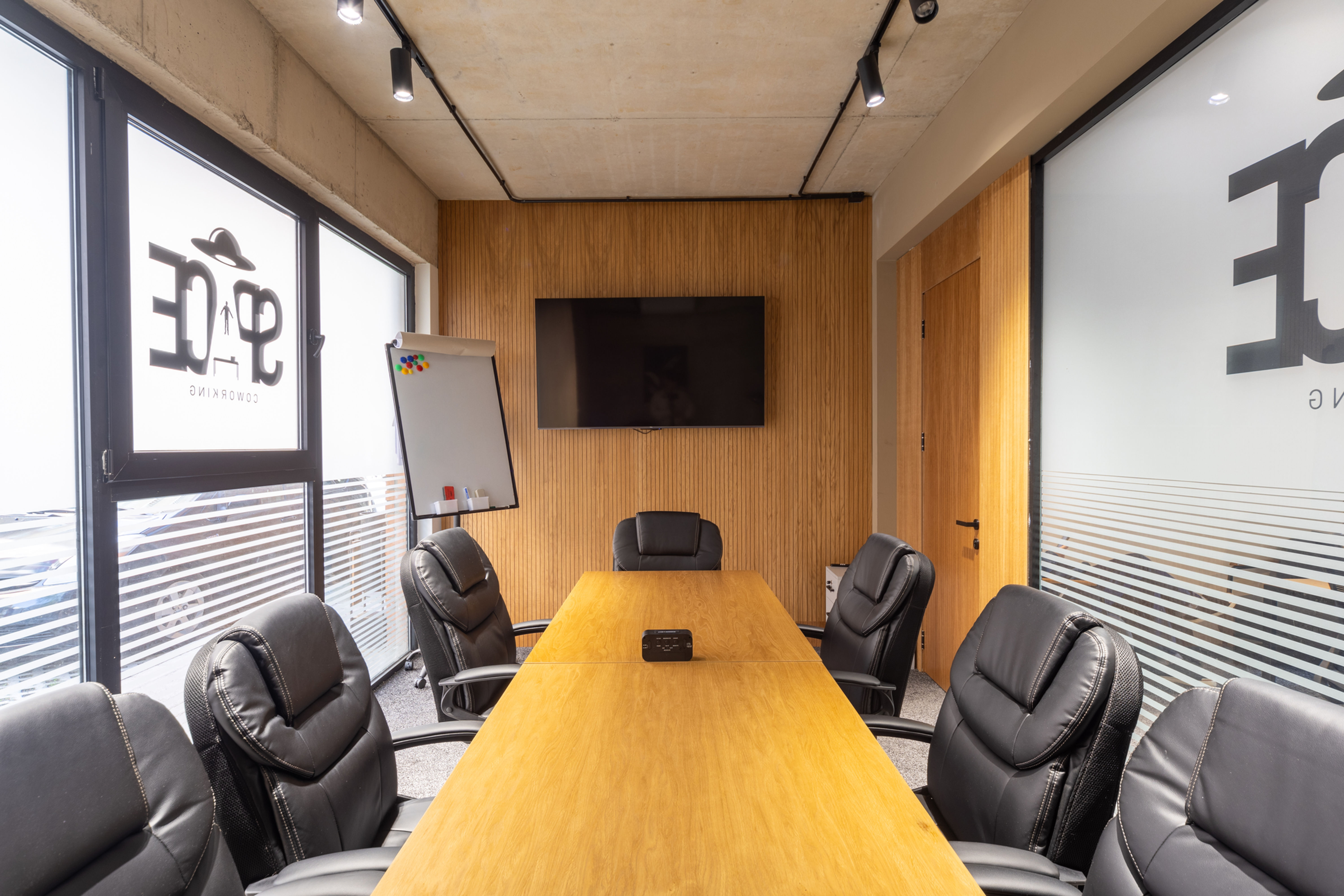 Meeting room in Cona coworking is available for booking