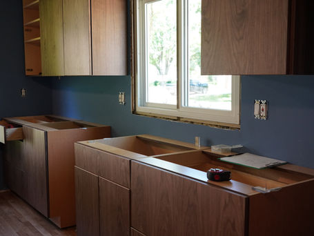Installed cabinets before countertop installation