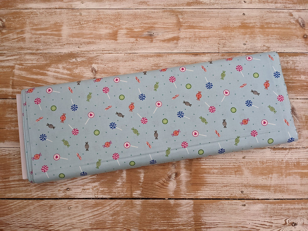 Thumbnail: Fabric with floral, leaf and dot pattern on a light blue background, The Fabric Squirrel