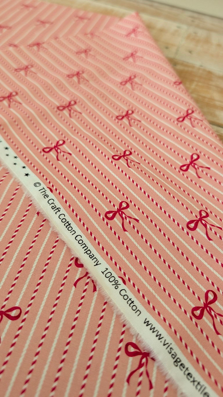 Thumbnail: Bow Stripe Pink Christmas Fabric - Baubles and Bells by Craft Cotton C