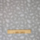 Gray fabric with white animal shapes and text, The Fabric Squirrel.