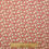 Thumbnail: Red fabric with small white flowers pattern, with wooden ruler in view.