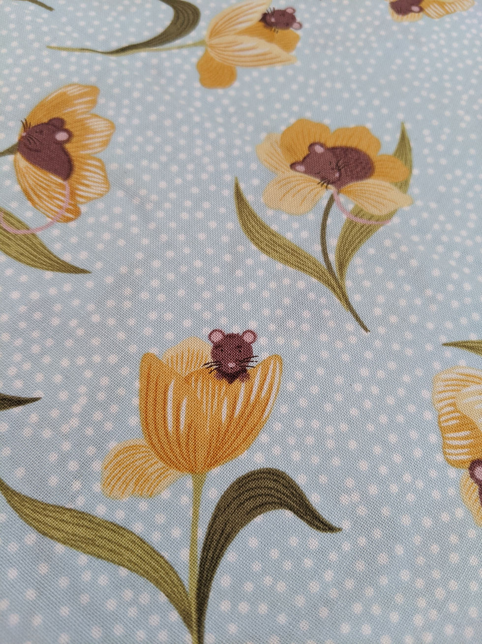 Thumbnail: Floral fabric with yellow flowers, a mouse, and white polka dots. The Fabric Squirrel