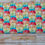 Thumbnail: Fabric repeating pattern with colorful popsicle design and ruler next to it.