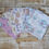 Thumbnail: Five fabric squares with cakes and teacups, a ruler lies on the wood