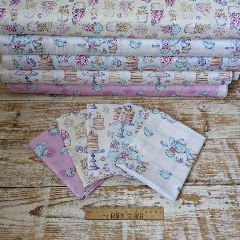 Thumbnail: Fabric swatches with teacups, cake, and floral patterns on wooden table by The Fabric Squirrel