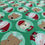 Thumbnail: Green fabric with Christmas character circles; Santa, fox, and reindeer.