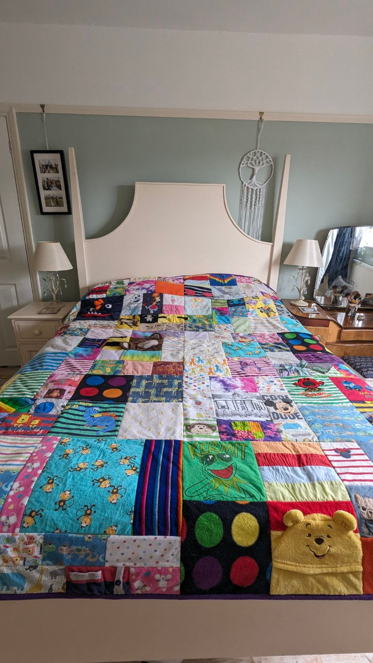 Thumbnail: My largest king size quilt displayed on a king size bed.