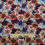 Thumbnail: Floral fabric with orange, purple, and blue flowers; the Fabric Squirrel.