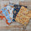 Thumbnail: Various fabric prints: Autumnal berries and foliage on ivory background The Fabric Squirrel