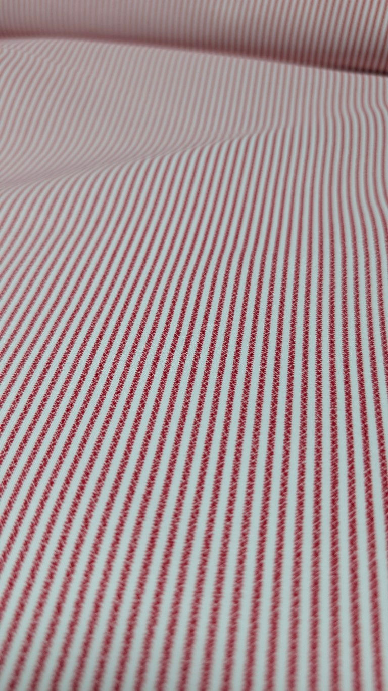 Thumbnail: Red and white striped fabric close-up background. Tea and Toadstools Fabric - Cottage Bliss Organic Woven Cotton.