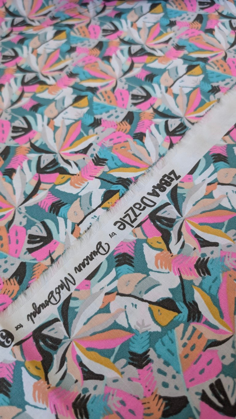 Thumbnail: Zebra Dazzle by Duncan McDougal fabric with colorful floral pattern and design.