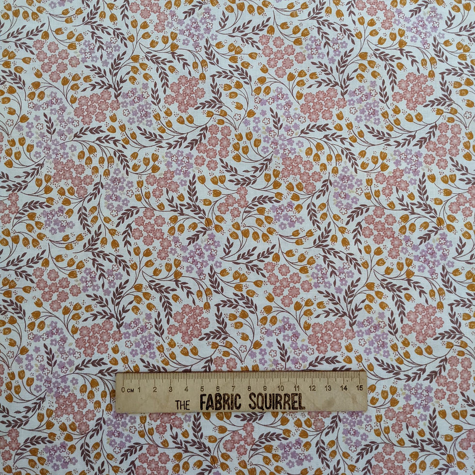 Floral fabric with pink, purple, and yellow flowers; Fabric Squirrel.