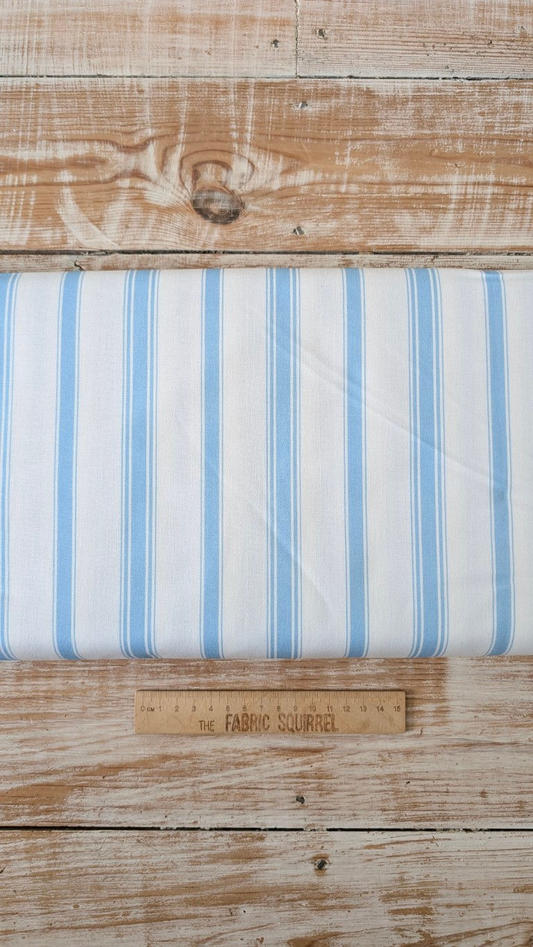 Thumbnail: White fabric with blue stripes. The Fabric Squirrel. Witches Hat Fabric.